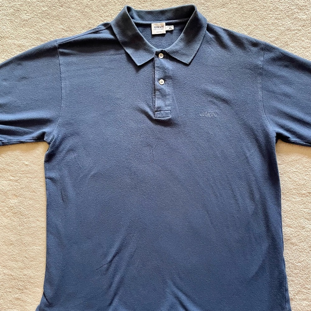 Armani polo shirt.  Label is XL, but fits like a medium.  Good condition.